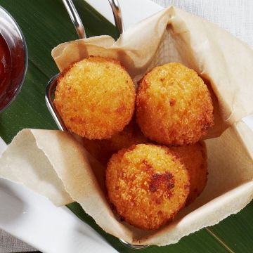 Mac and cheese poppers served with ketchup on the side